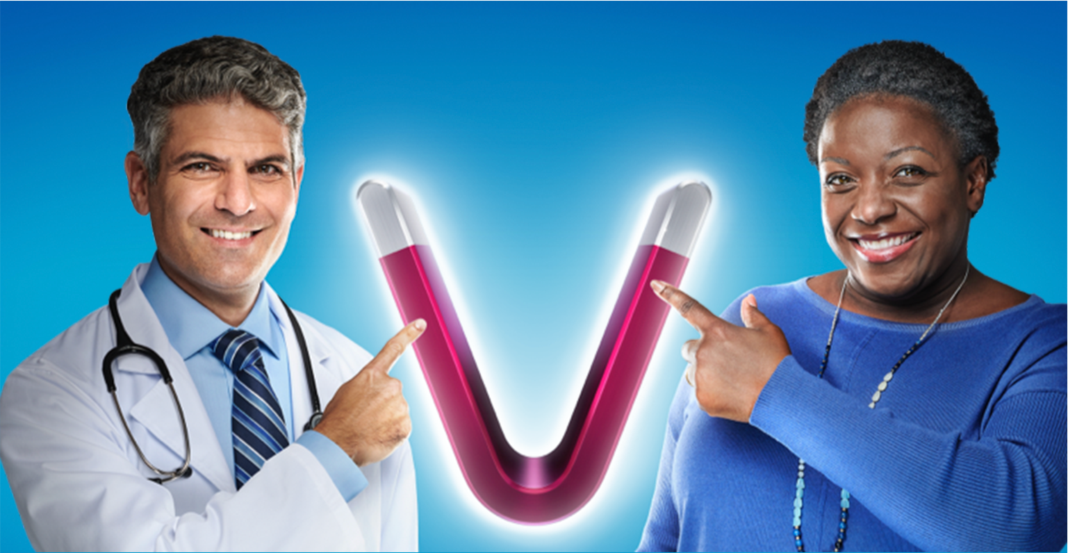 Image of healthcare provider and patient pointing to a V-shaped magnet