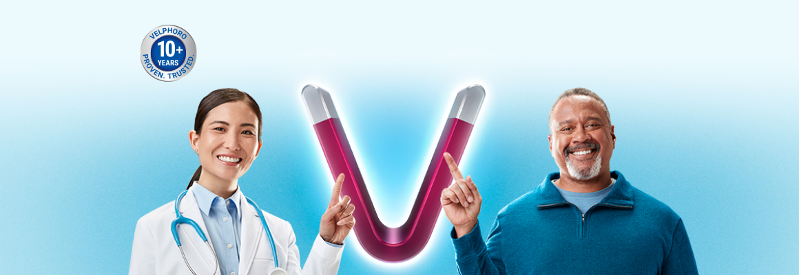 Image of healthcare provider and patient pointing to a V-shaped magnet